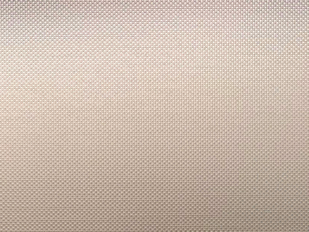 Linnenmotief patroon in RVS met een zachte roze-mauve Bronze-TiN coating