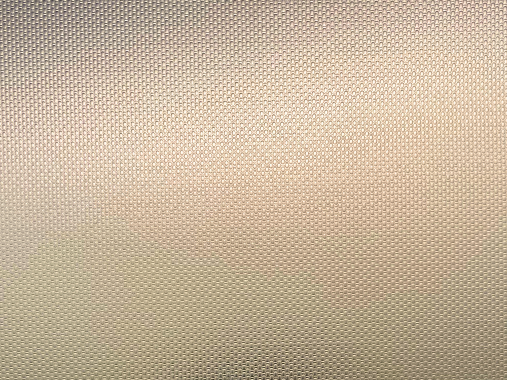 Linnenmotief patroon in RVS met een perzikkleurige Rose Gold-TiN coating